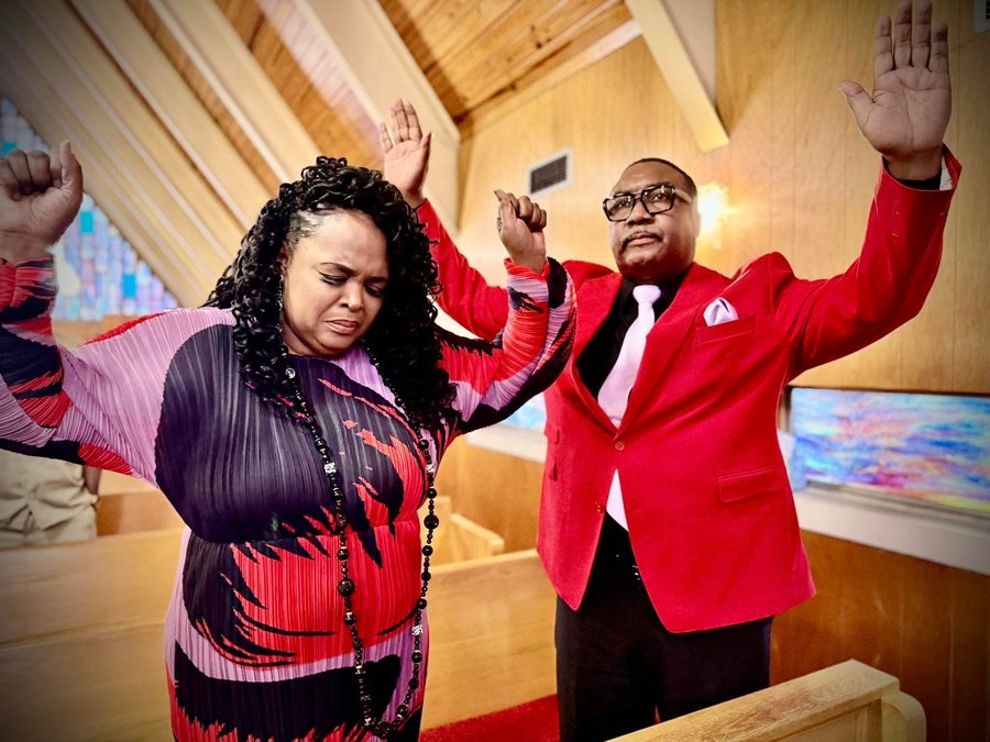 Pastor Levoris Snow and First Lady Angela Snow worshiping together at Word of Life Faith Church